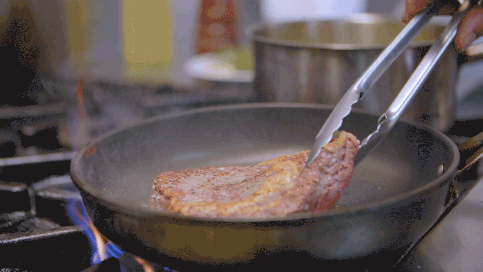 Greenstone Creek steak cooking in pan